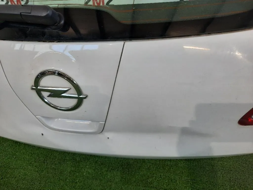 Portello POST NUDA Opel Astra J 2010