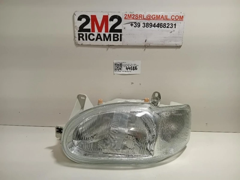Proiettore ANT SX 95AG 13W030 FC Ford Escort VII 1995