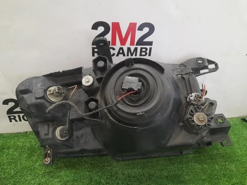 Proiettore ANT SX KOITO100-87419 Mitsubishi Pajero IV 2007