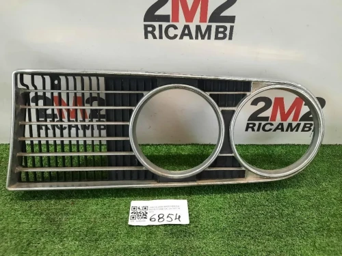 Mascherina Proiettore SX  Lancia 2000