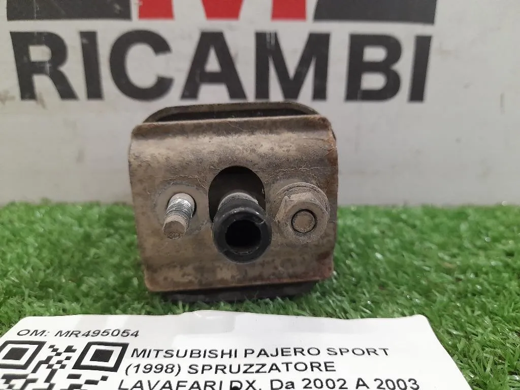 Spruzzatore Lavafari DX MR495054 DX Mitsubishi Pajero Sport 1998