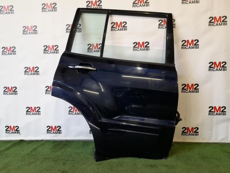 Porta POST DX 5730A264 Mitsubishi Pajero III 2000