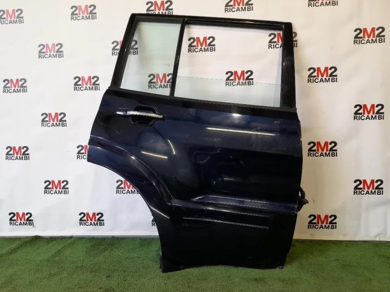 Porta POST DX 5730A264 Mitsubishi Pajero III 2000