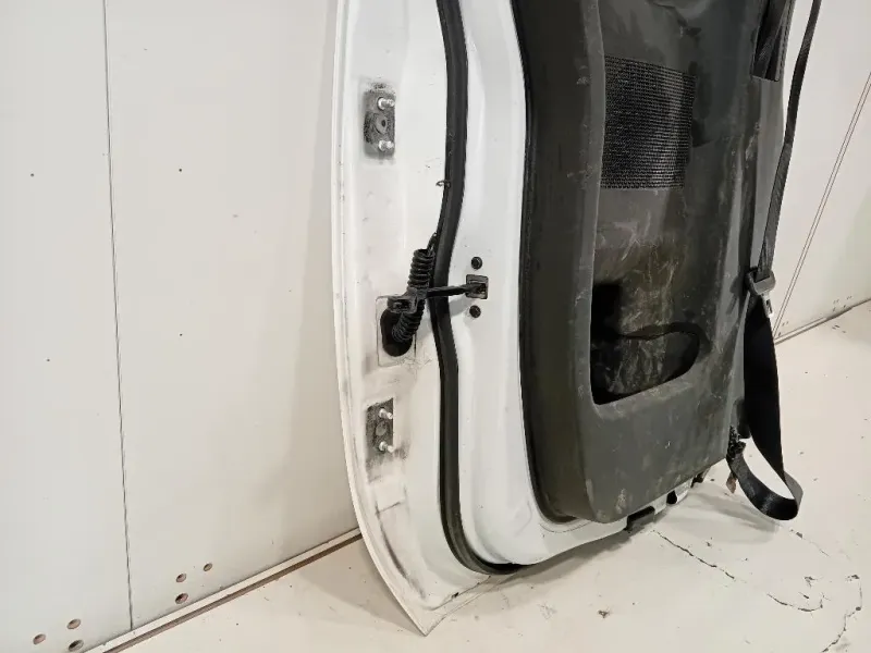 Porta POST SX 82101EB30J Nissan Navara 2010