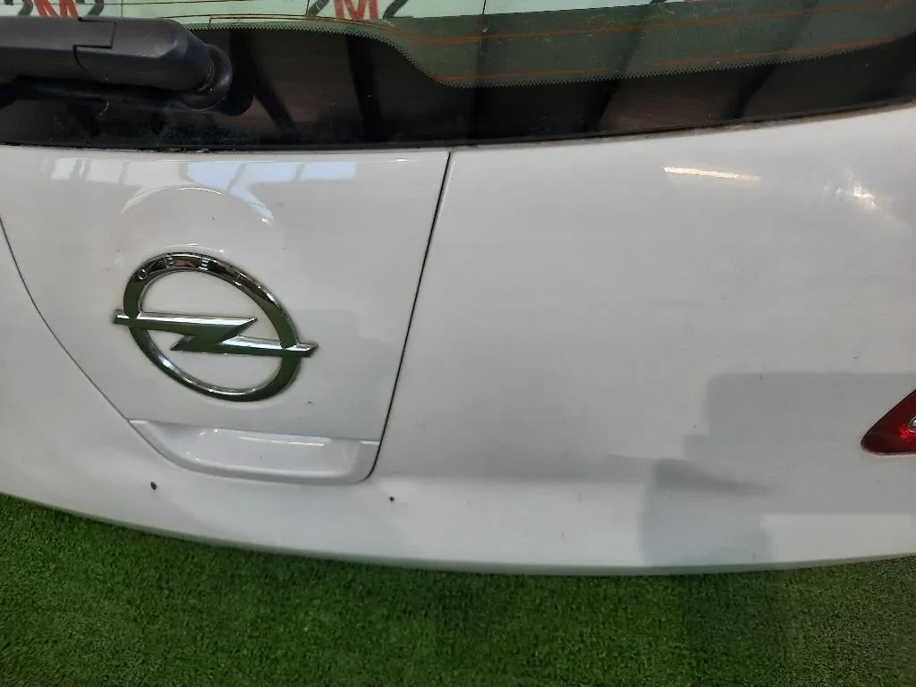 Portello POST NUDA Opel Astra J 2010