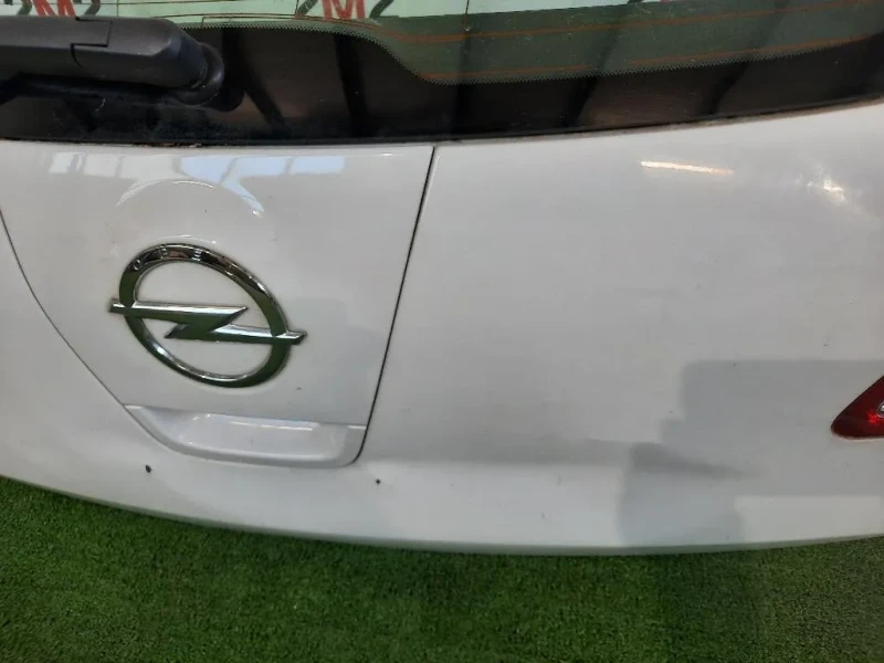 Portello POST NUDA Opel Astra J 2010