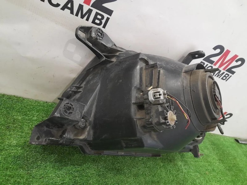 Proiettore ANT DX KOITO100-87419 Mitsubishi Pajero IV 2007