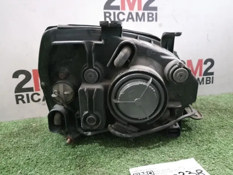 Proiettore ANT SX 0K2FA51020 Kia Carens II 2002