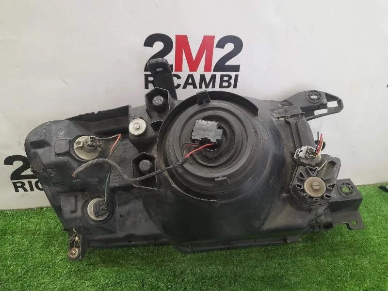 Proiettore ANT SX KOITO100-87419 Mitsubishi Pajero IV 2007
