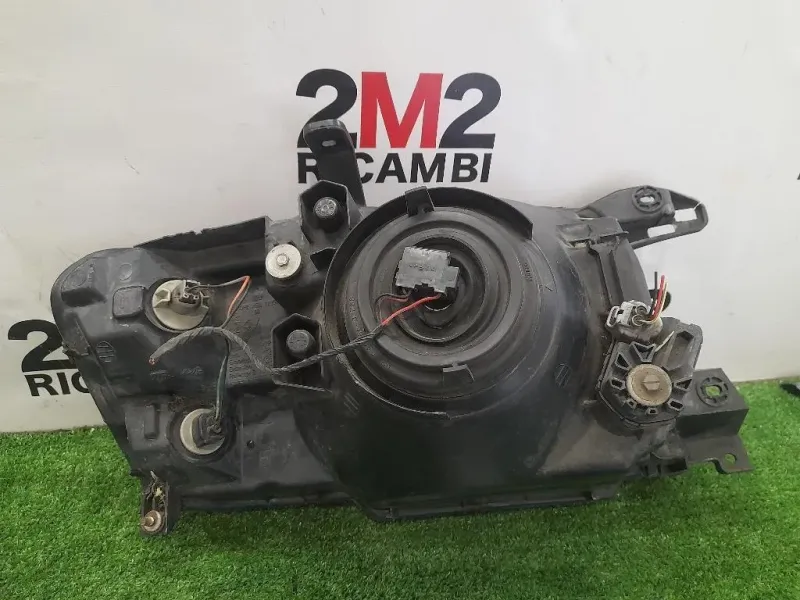 Proiettore ANT SX KOITO100-87419 Mitsubishi Pajero IV 2007