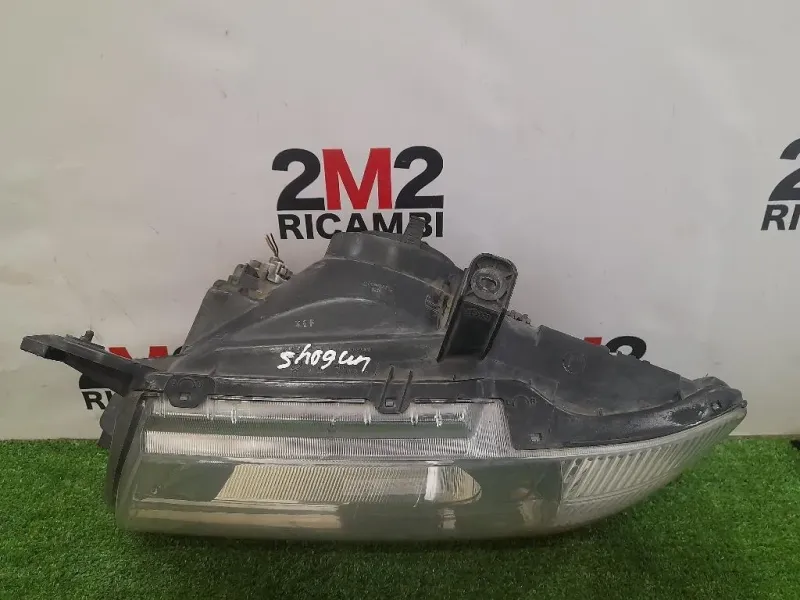 Proiettore ANT SX KOITO100-87419 Mitsubishi Pajero IV 2007