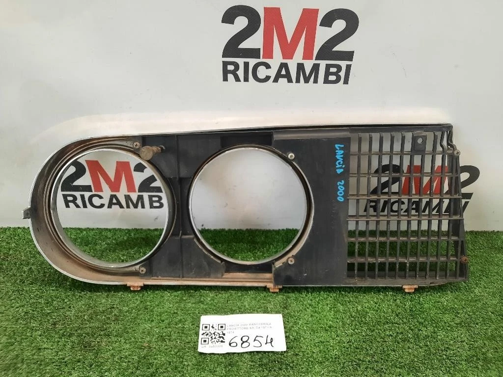 Mascherina Proiettore SX Lancia 2000