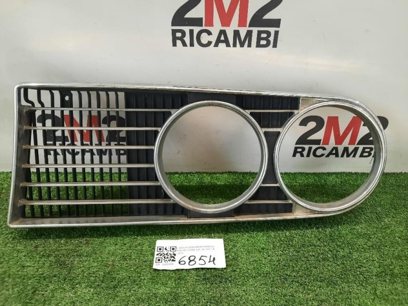 Mascherina Proiettore SX Lancia 2000