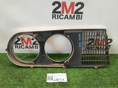 Mascherina Proiettore SX Lancia 2000