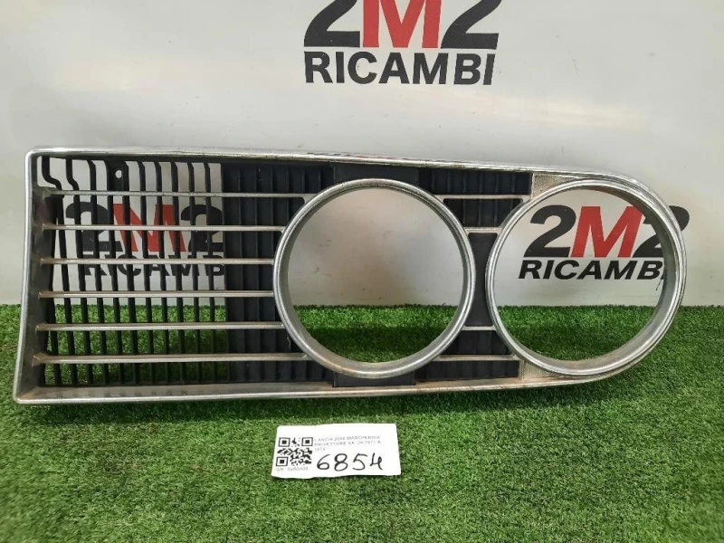 Mascherina Proiettore SX Lancia 2000