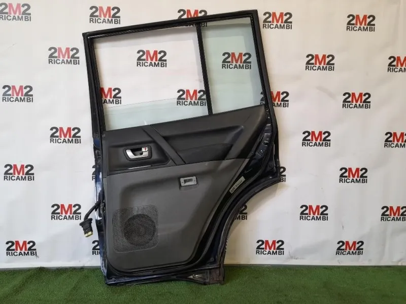 Porta POST DX 5730A264 Mitsubishi Pajero III 2000
